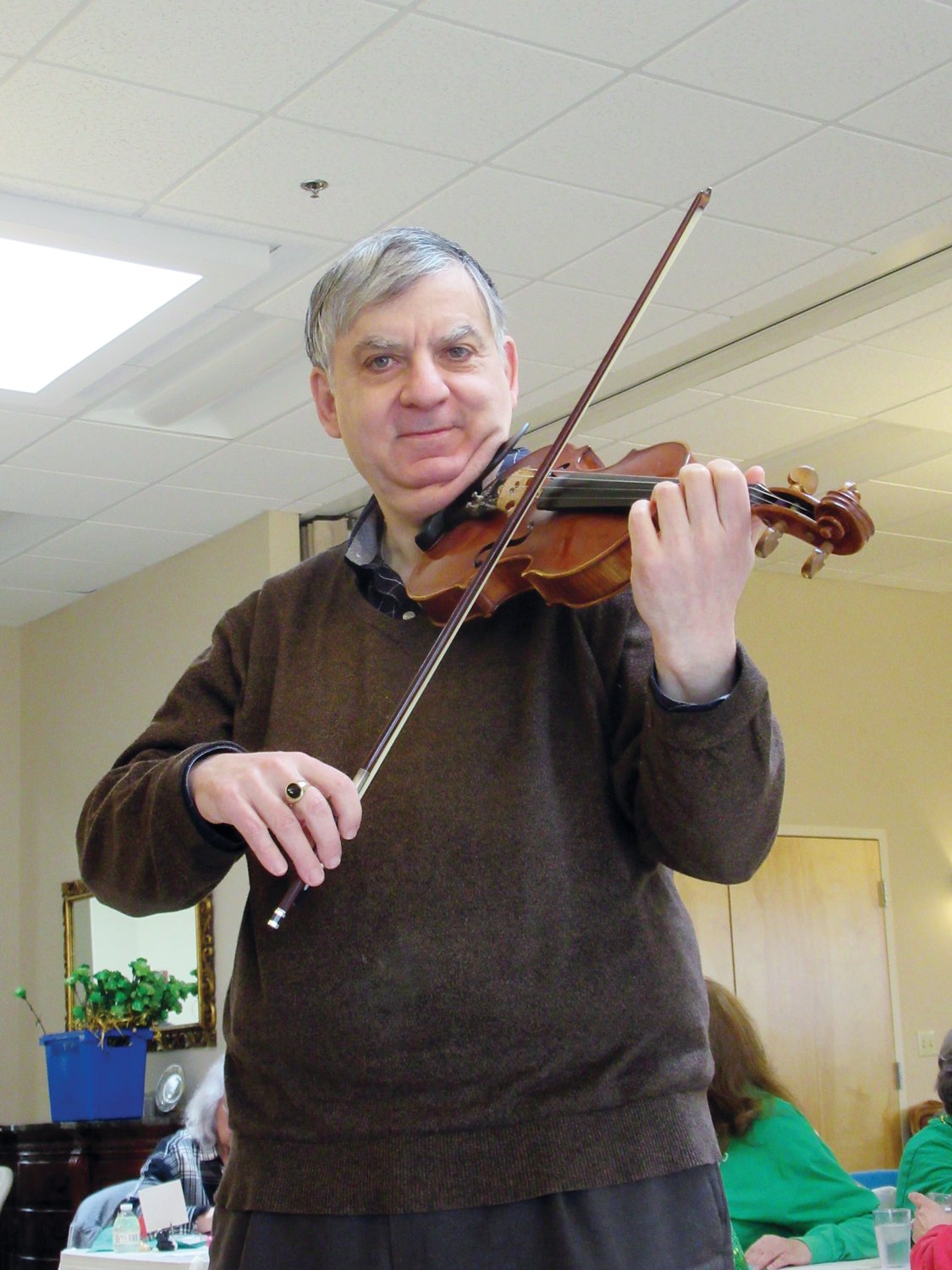 CLASSICAL COMPOSER: Highly accomplished violinist Gregory Ariyan made a special guest appearance at last week’s JSC St. Patrick’s Day Party.